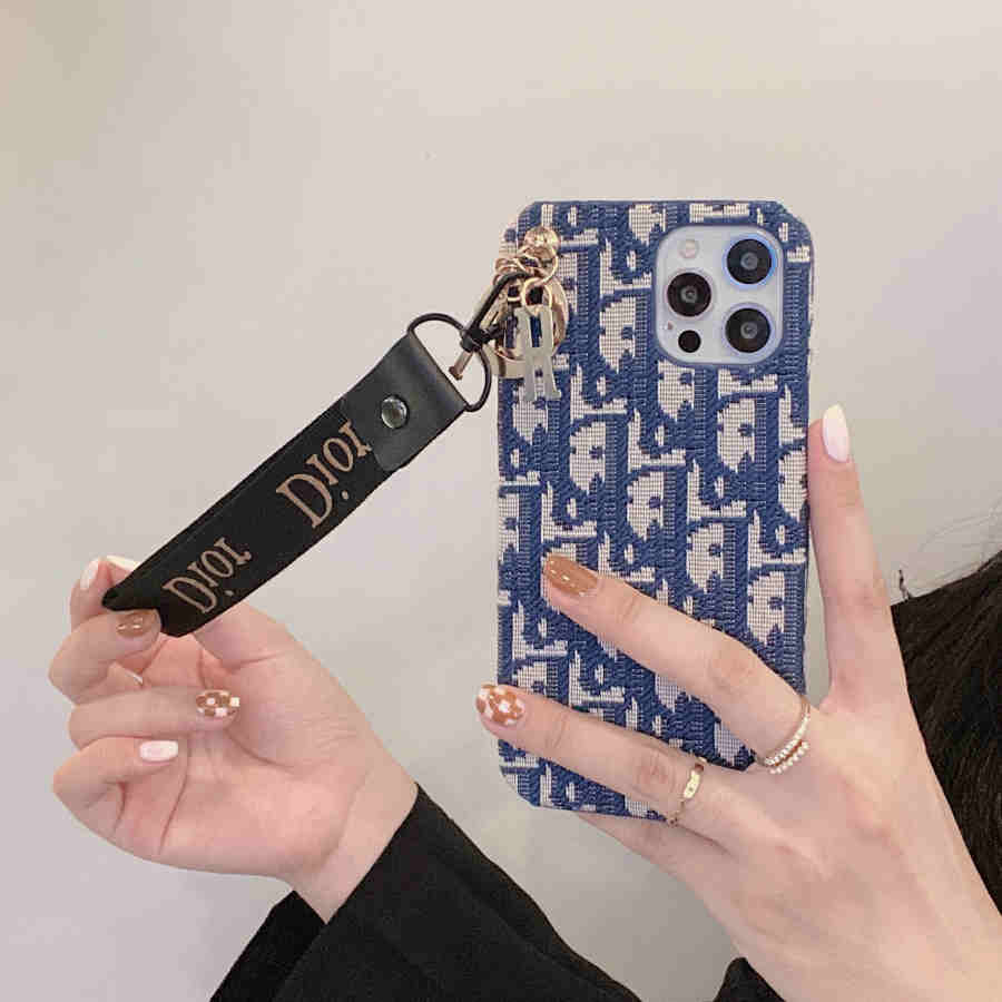 Dior-inspired all-over pattern phone case with hand strap