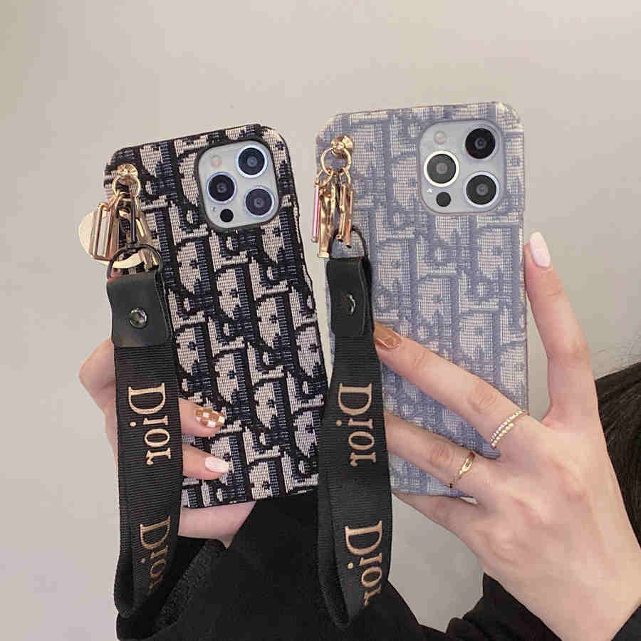 Dior-inspired all-over pattern phone case with hand strap