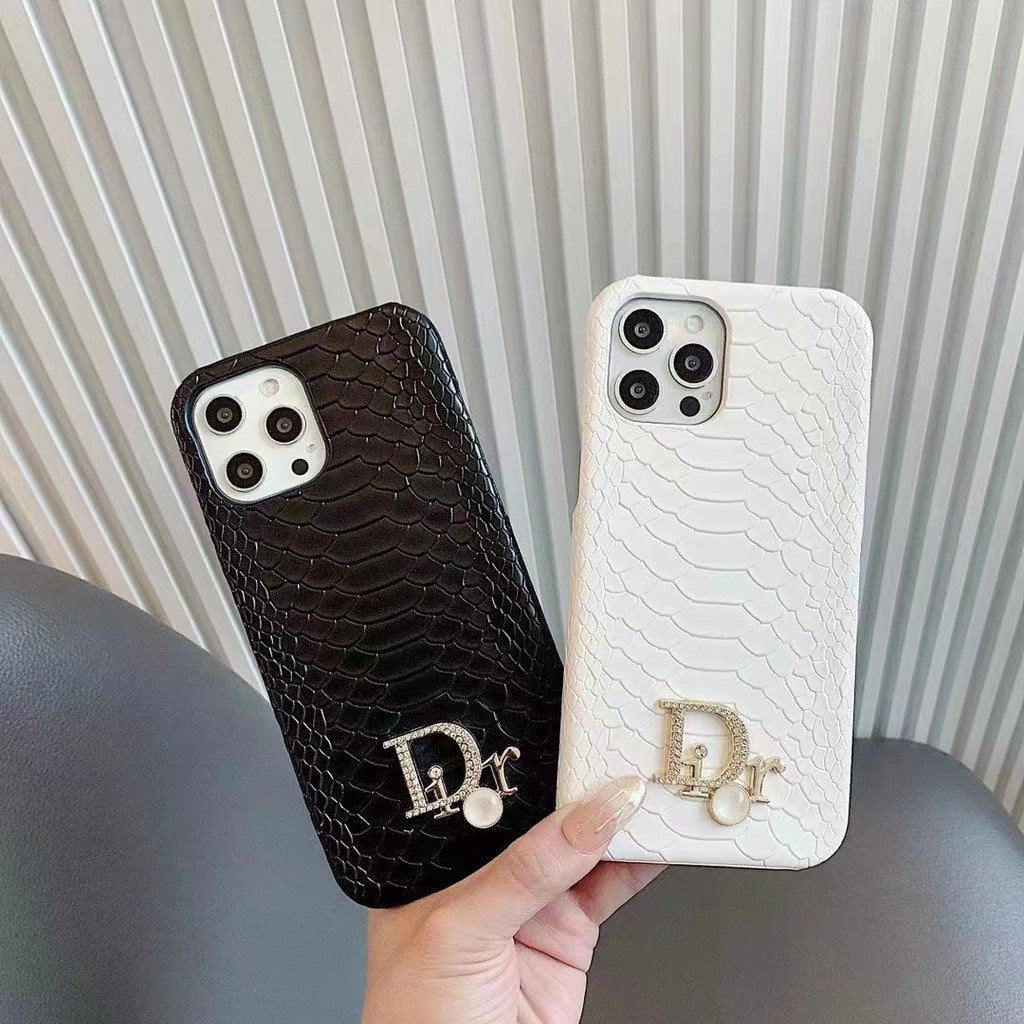 Dior-inspired snake texture iPhone case with emblem detail