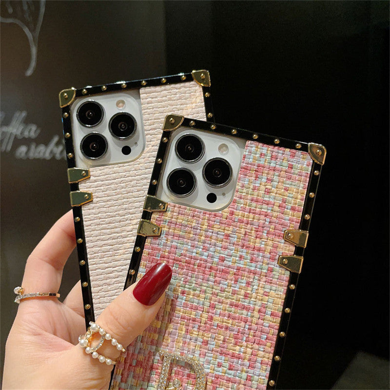 Dior-inspired geometric trunk-style case for iPhone 13 Pro