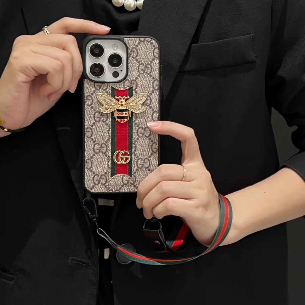 Gucci-inspired iPhone case with hand strap