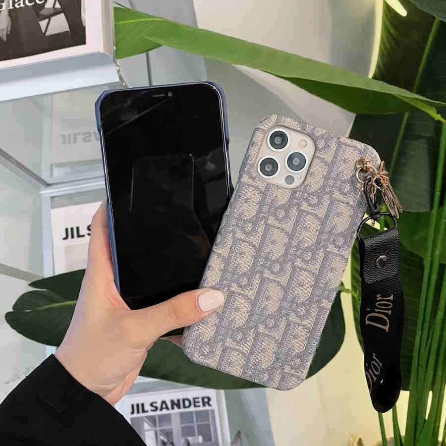 Dior-inspired all-over pattern phone case with hand strap