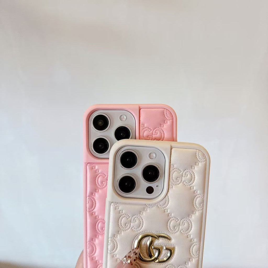 Gucci-inspired quilted iPhone case with metal emblem