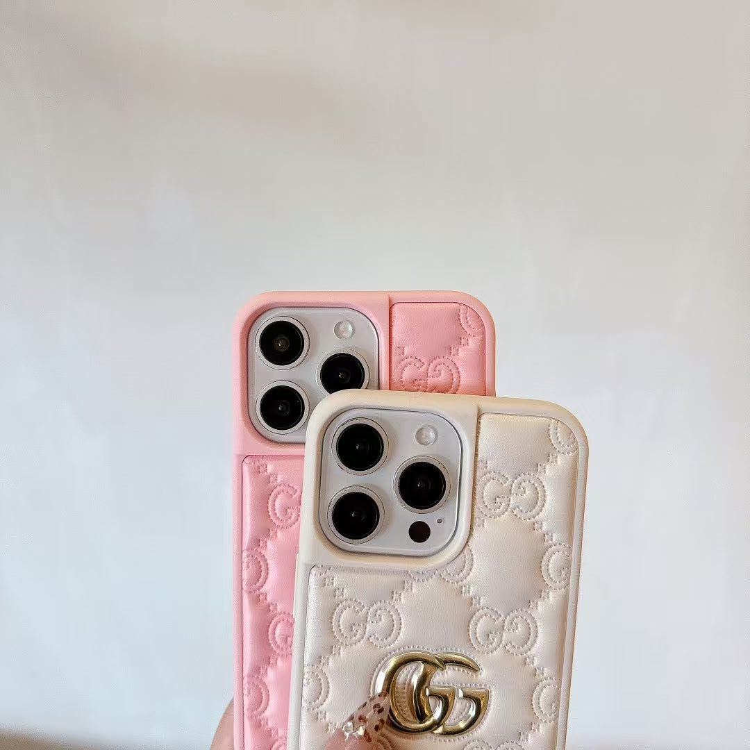 Gucci-inspired quilted iPhone case with metal emblem
