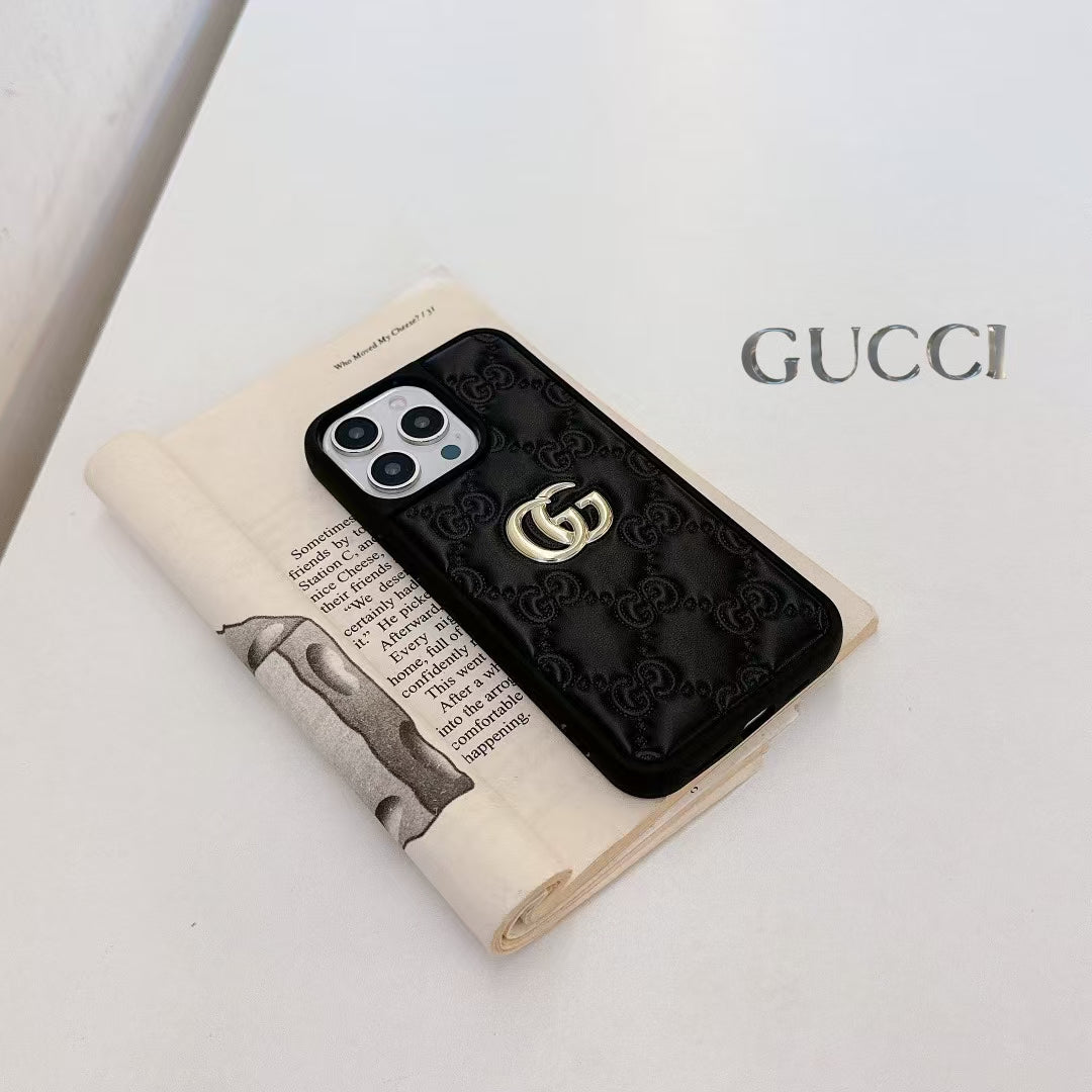 Gucci-inspired quilted iPhone case with metal emblem