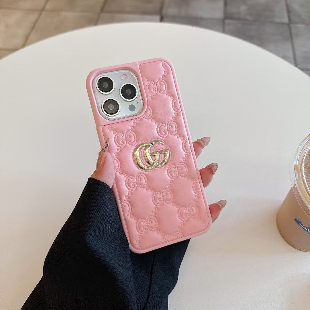 Gucci-inspired quilted iPhone case with metal emblem