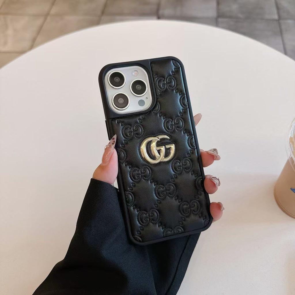 Gucci-inspired quilted iPhone case with metal emblem