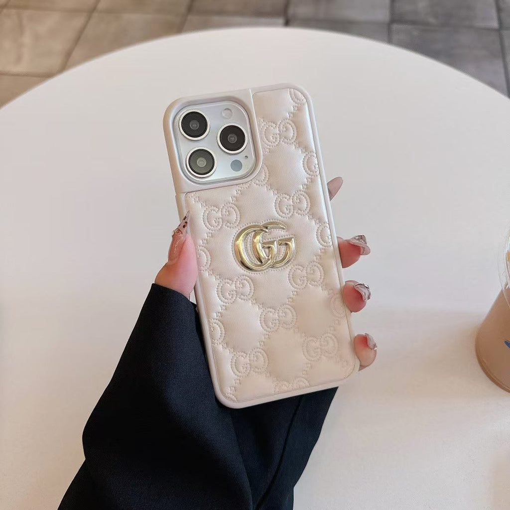 Gucci-inspired quilted iPhone case with metal emblem