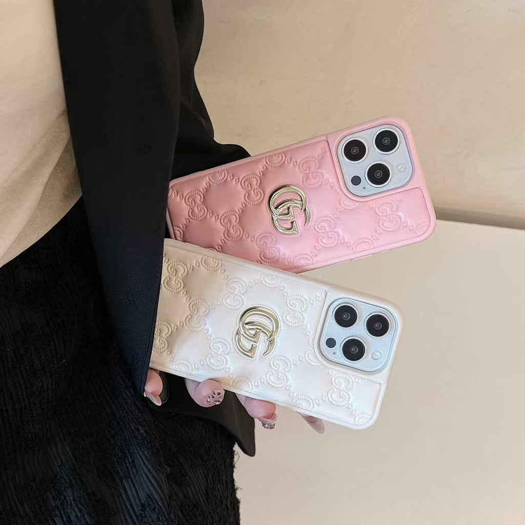 Gucci-inspired quilted iPhone case with metal emblem