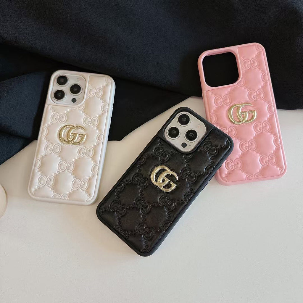 Gucci-inspired quilted iPhone case with metal emblem
