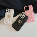 Gucci-inspired quilted iPhone case with metal emblem