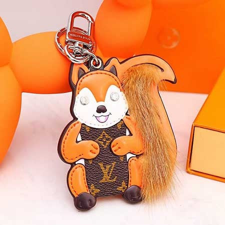 Louis Vuitton-inspired leather keychain with character design