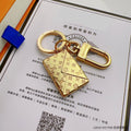 Louis Vuitton-inspired gold-tone envelope charm keychain