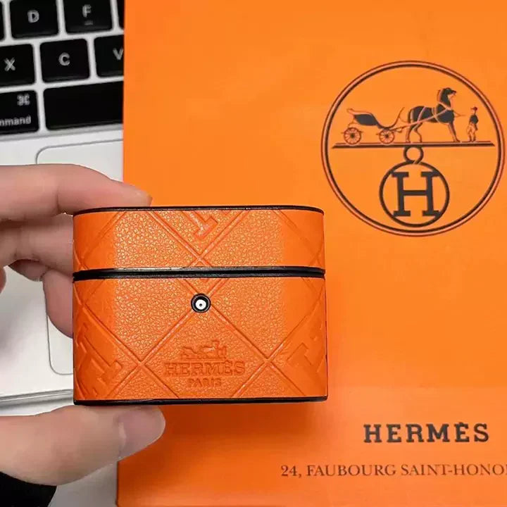 Hermes-inspired leather AirPods case with envelope detail, orange