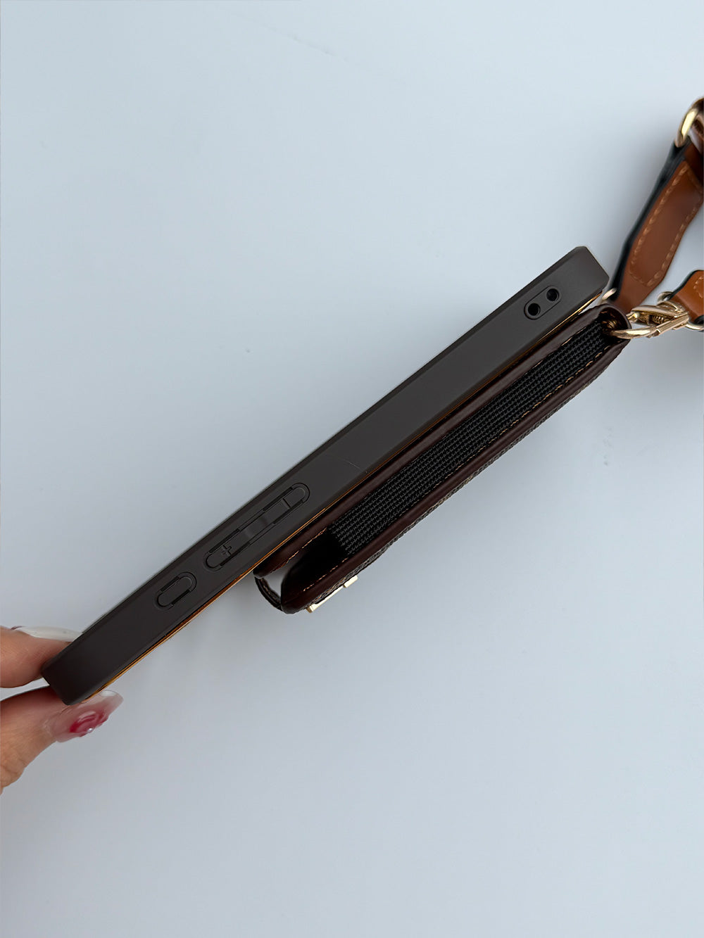 Louis Vuitton-inspired brown iPhone case with wallet card and strap