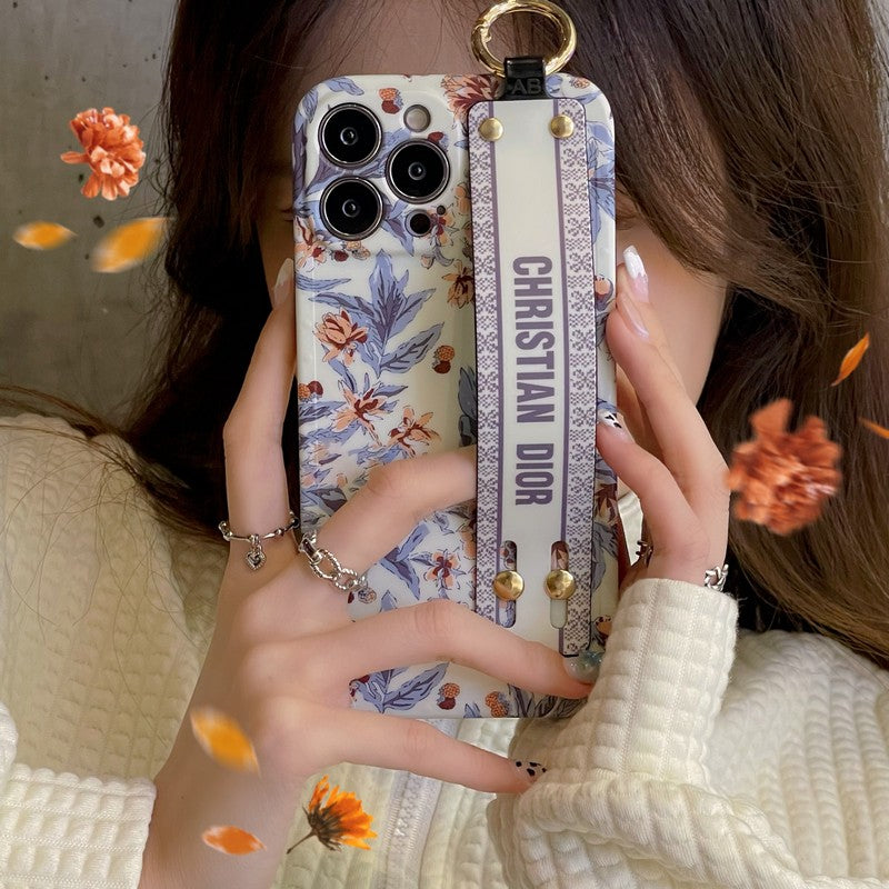 Dior-inspired purple and white iPhone case with hand strap