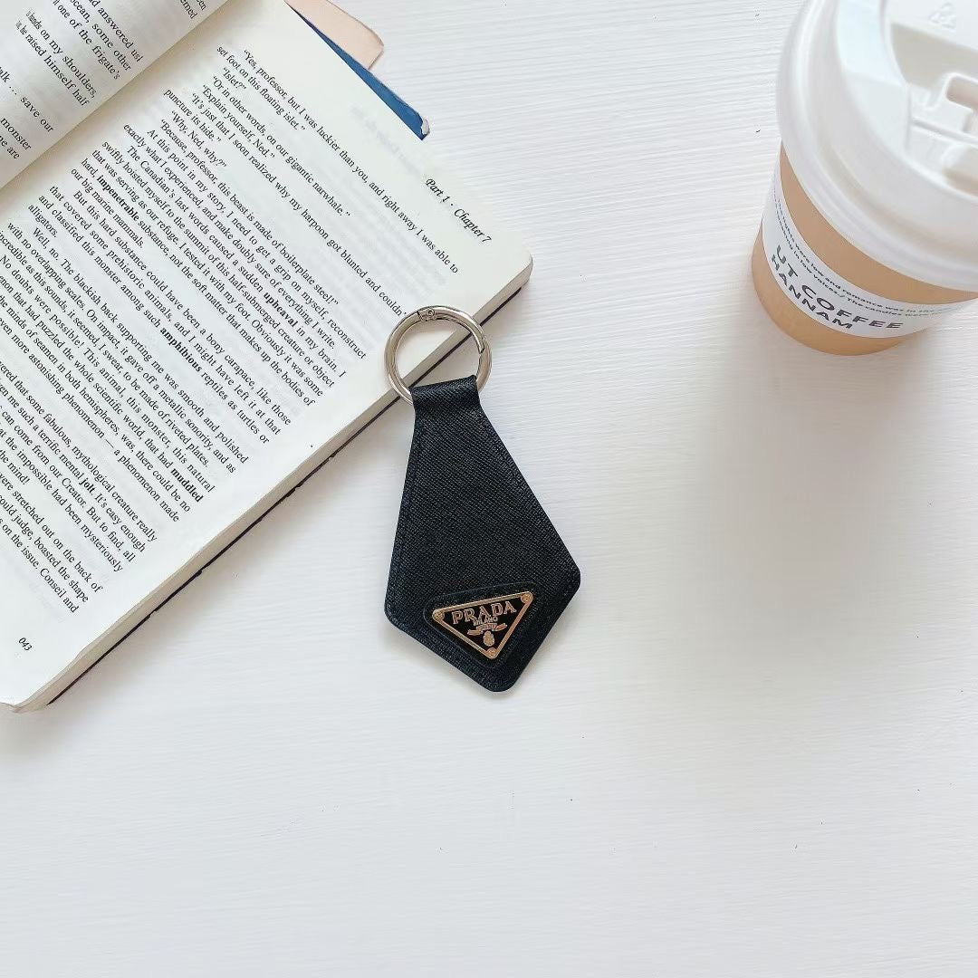 Prada-inspired leather keychain with triangle detail, black