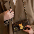 Louis Vuitton-inspired iPhone case with card holder and chain, brown with strap