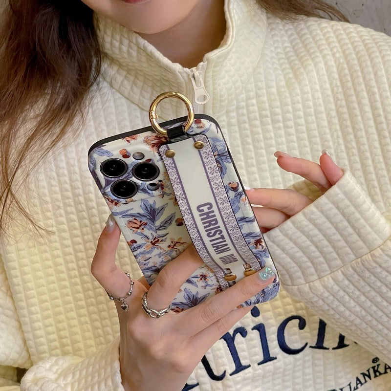 Dior-inspired purple and white iPhone case with hand strap