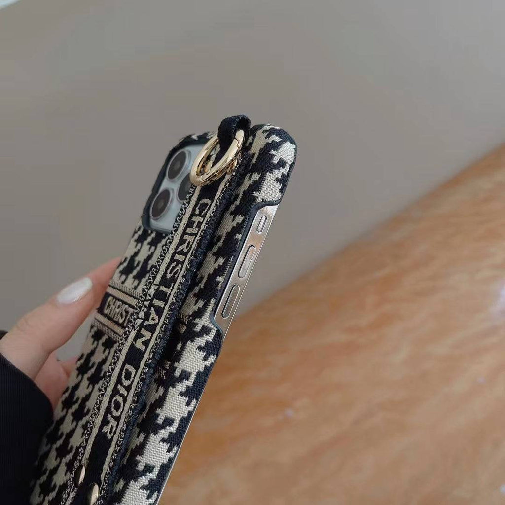 Dior-inspired phone case with hand strap for iPhone