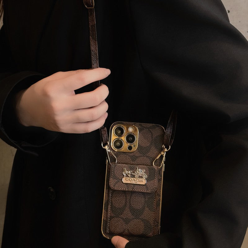 Coach-inspired leather iPhone case with card holder and strap