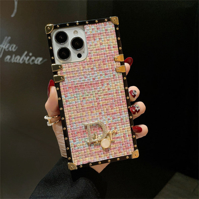 Dior-inspired geometric trunk-style case for iPhone 13 Pro