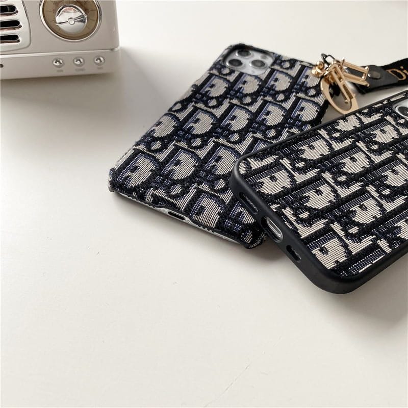 Dior-inspired all-over pattern phone case with hand strap