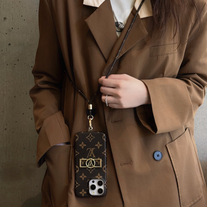 Louis Vuitton-inspired monogram iPhone case with crossbody strap