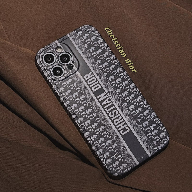 Dior-inspired patterned iPhone case with chain accent