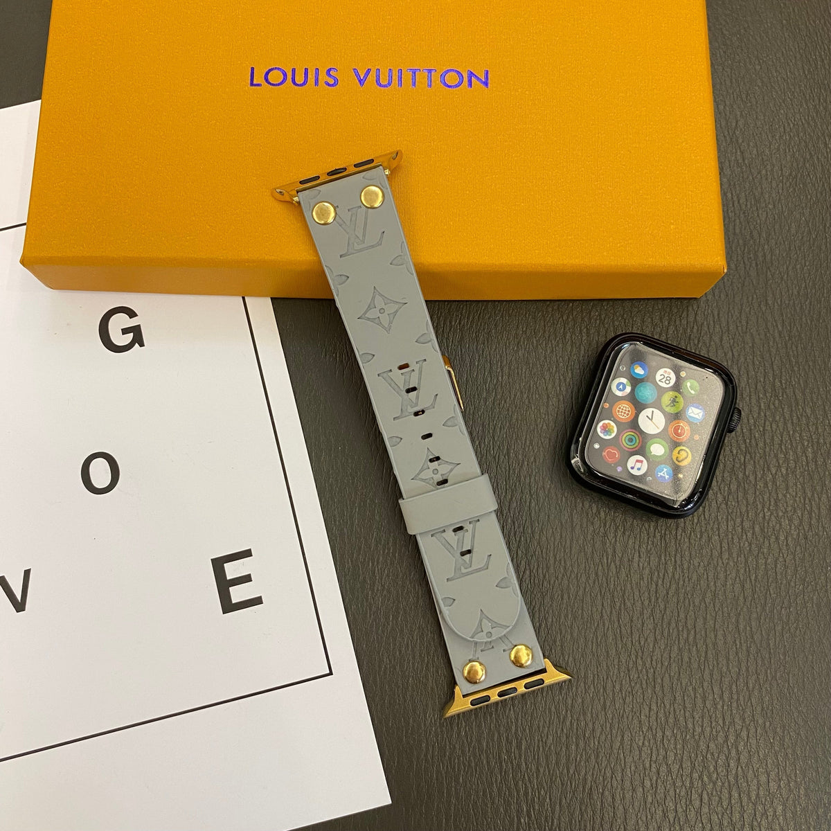 Louis Vuitton-inspired embossed monogram Apple Watch band with rivet details