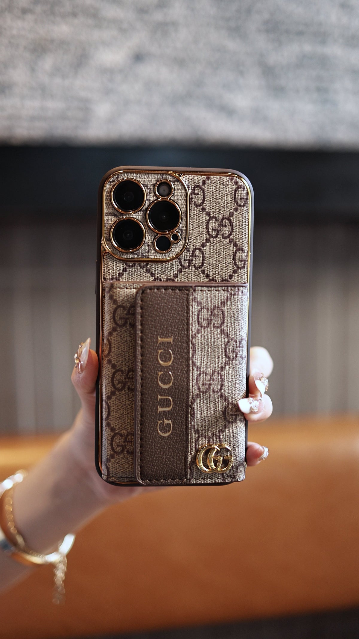 Louis Vuitton-inspired leather iPhone case with card holder and strap