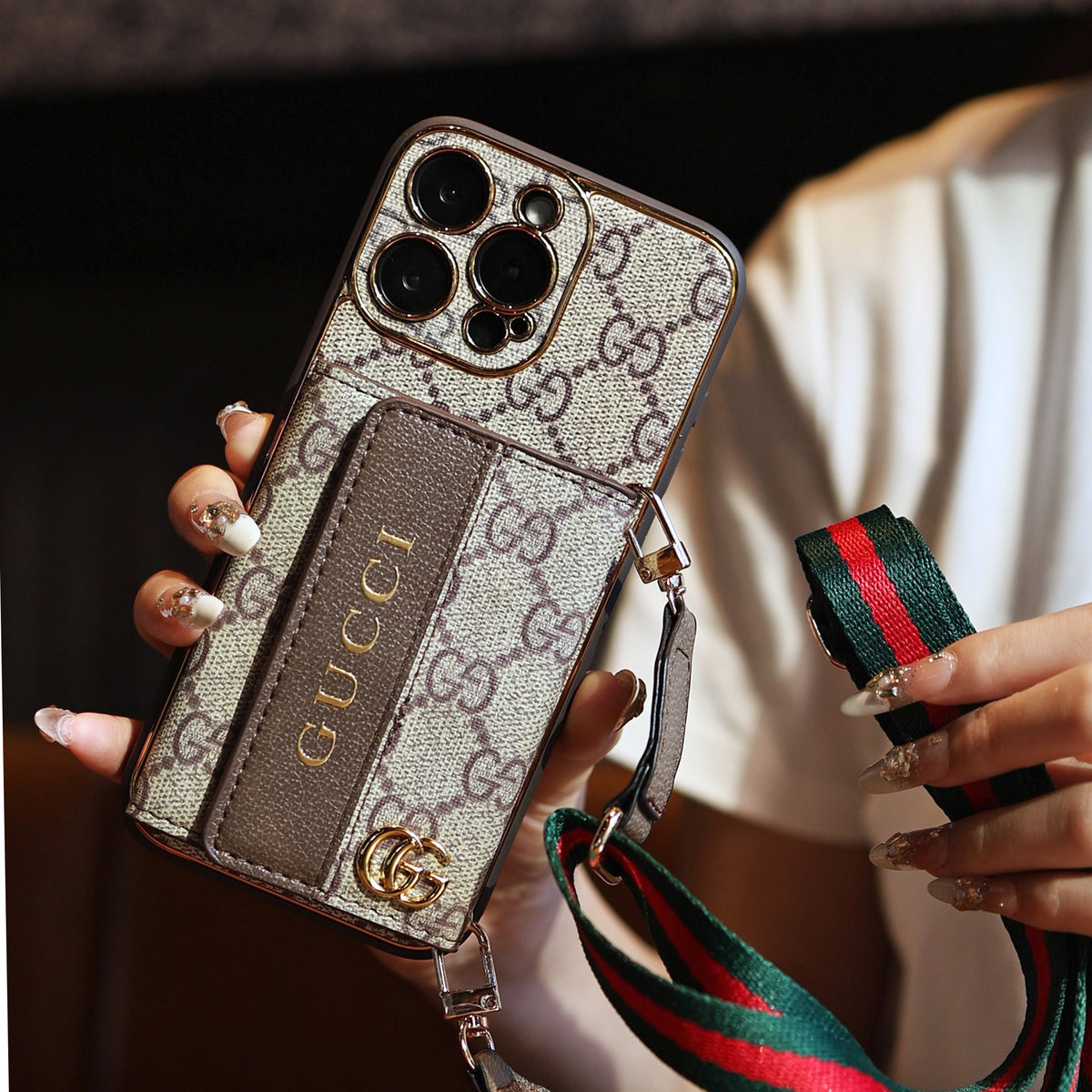 Louis Vuitton-inspired leather iPhone case with card holder and strap