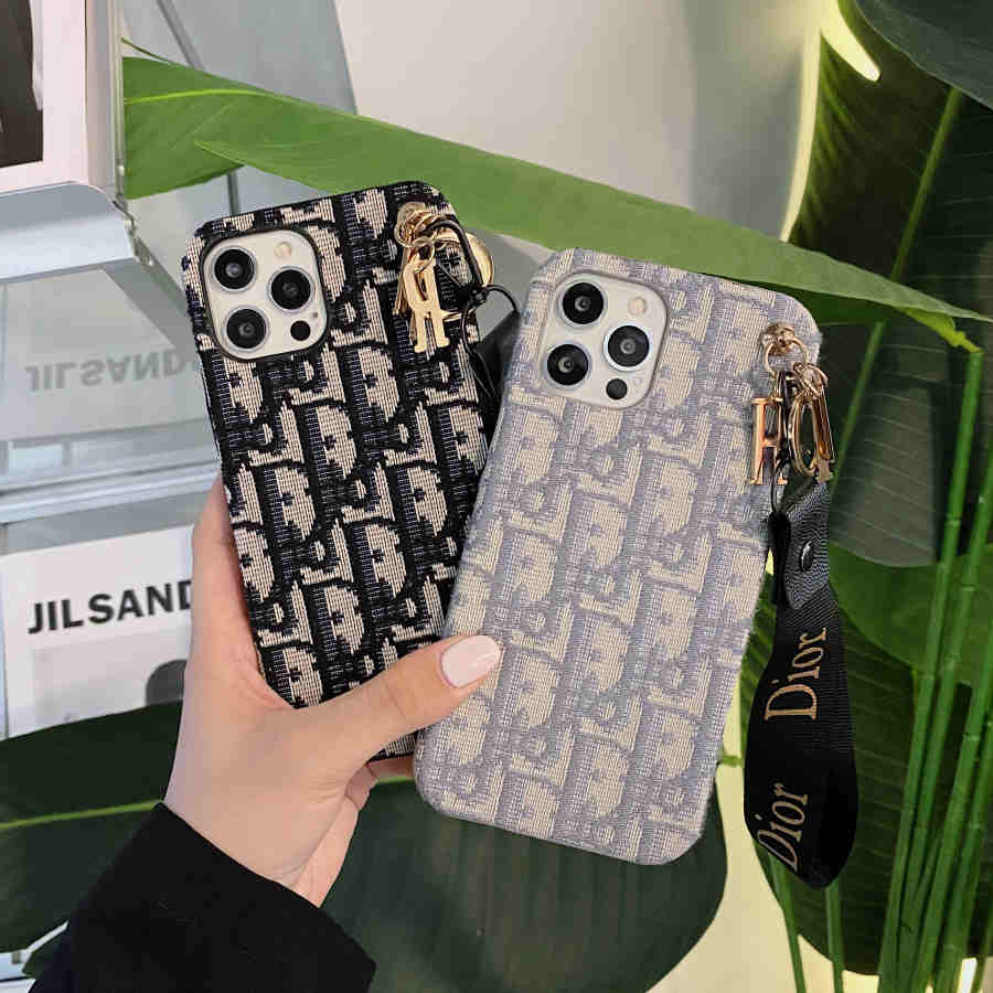 Dior-inspired all-over pattern phone case with hand strap