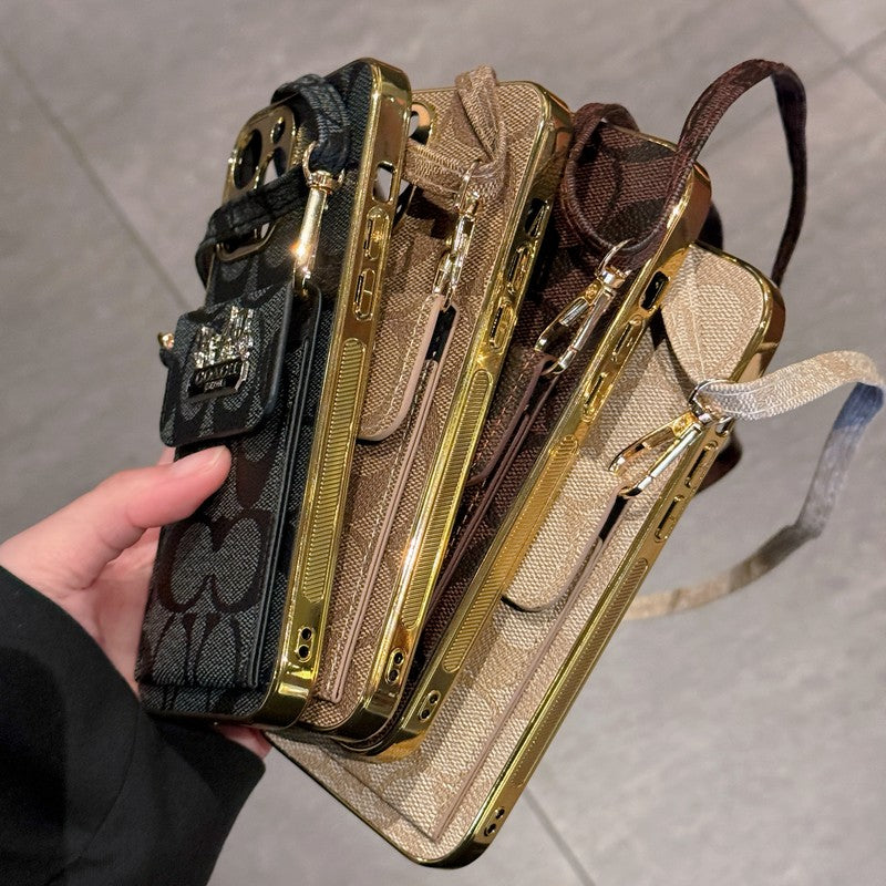 Coach-inspired leather iPhone case with card holder and strap