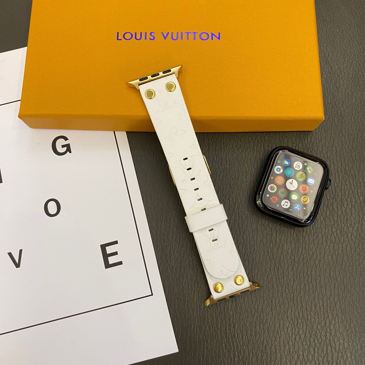 Louis Vuitton-inspired embossed monogram Apple Watch band with rivet details
