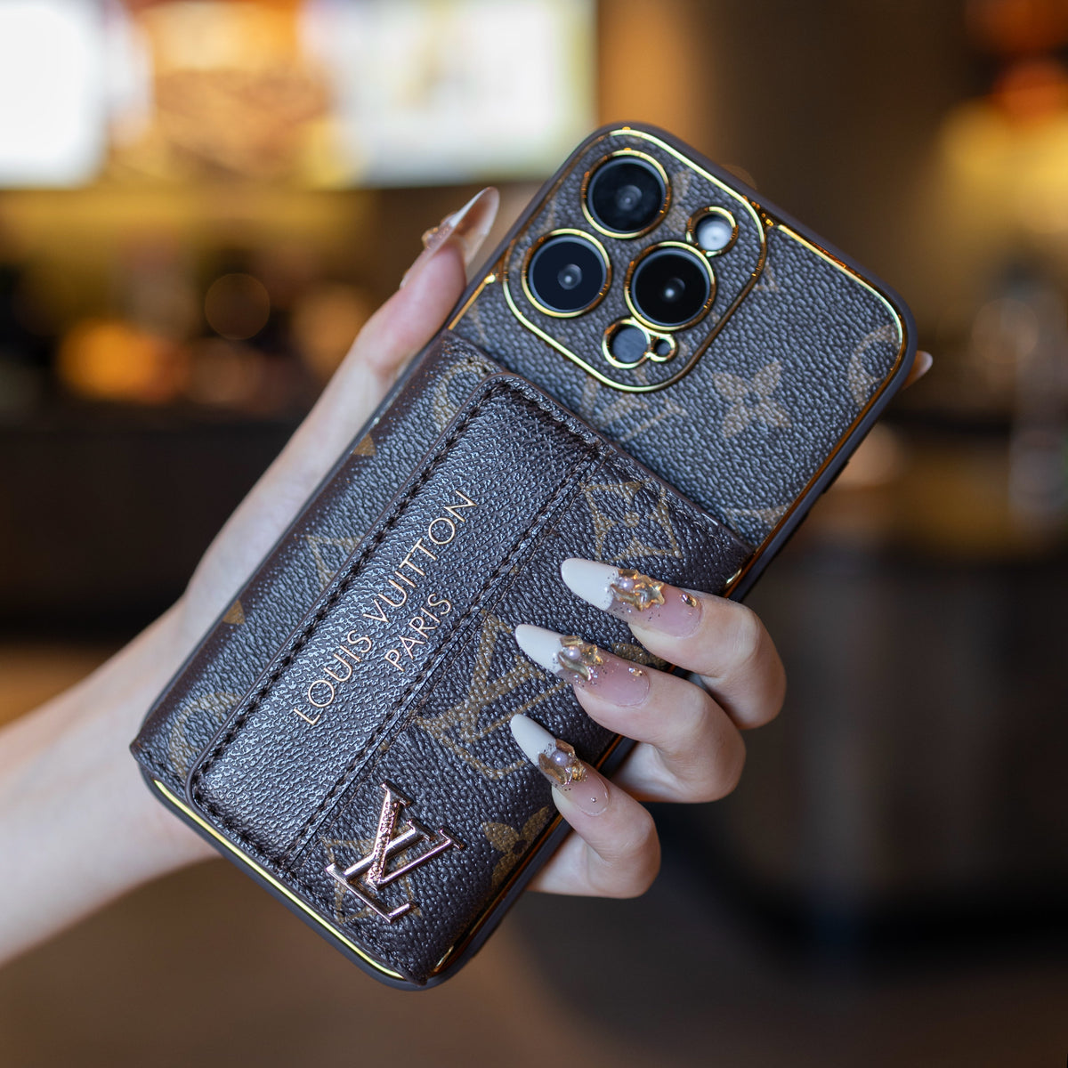 Louis Vuitton-inspired leather iPhone case with card holder and strap