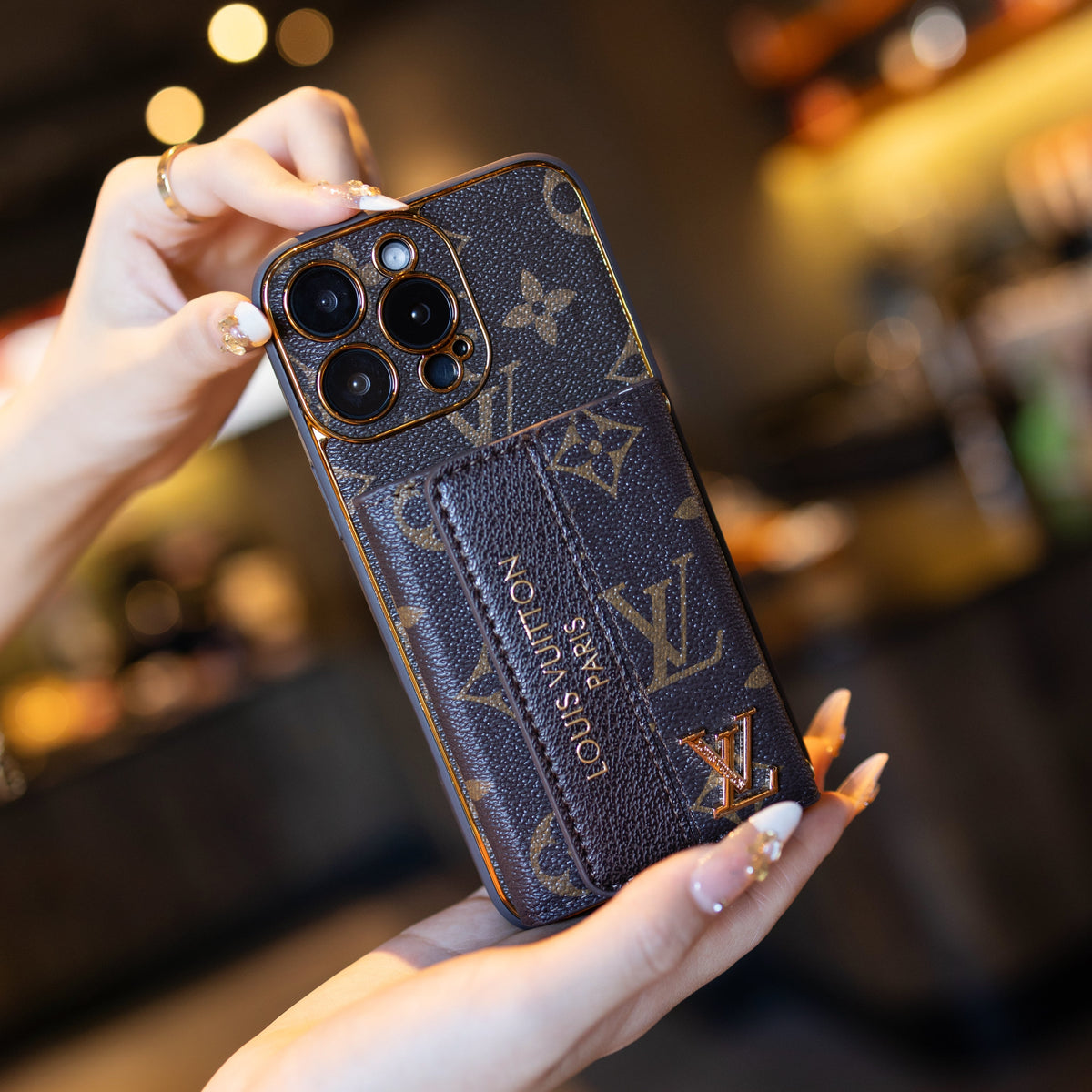 Louis Vuitton-inspired leather iPhone case with card holder and strap