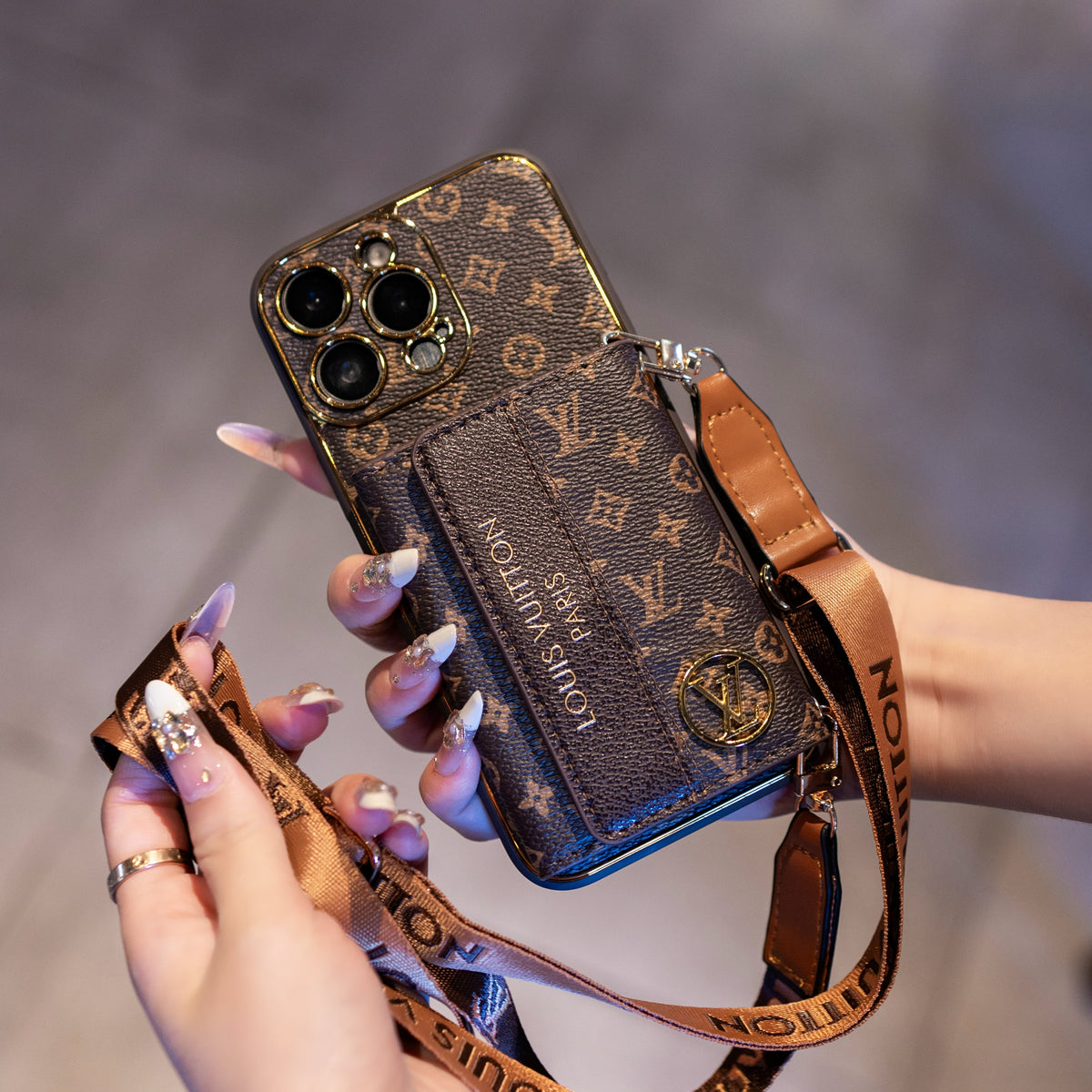 Louis Vuitton-inspired leather iPhone case with card holder and strap