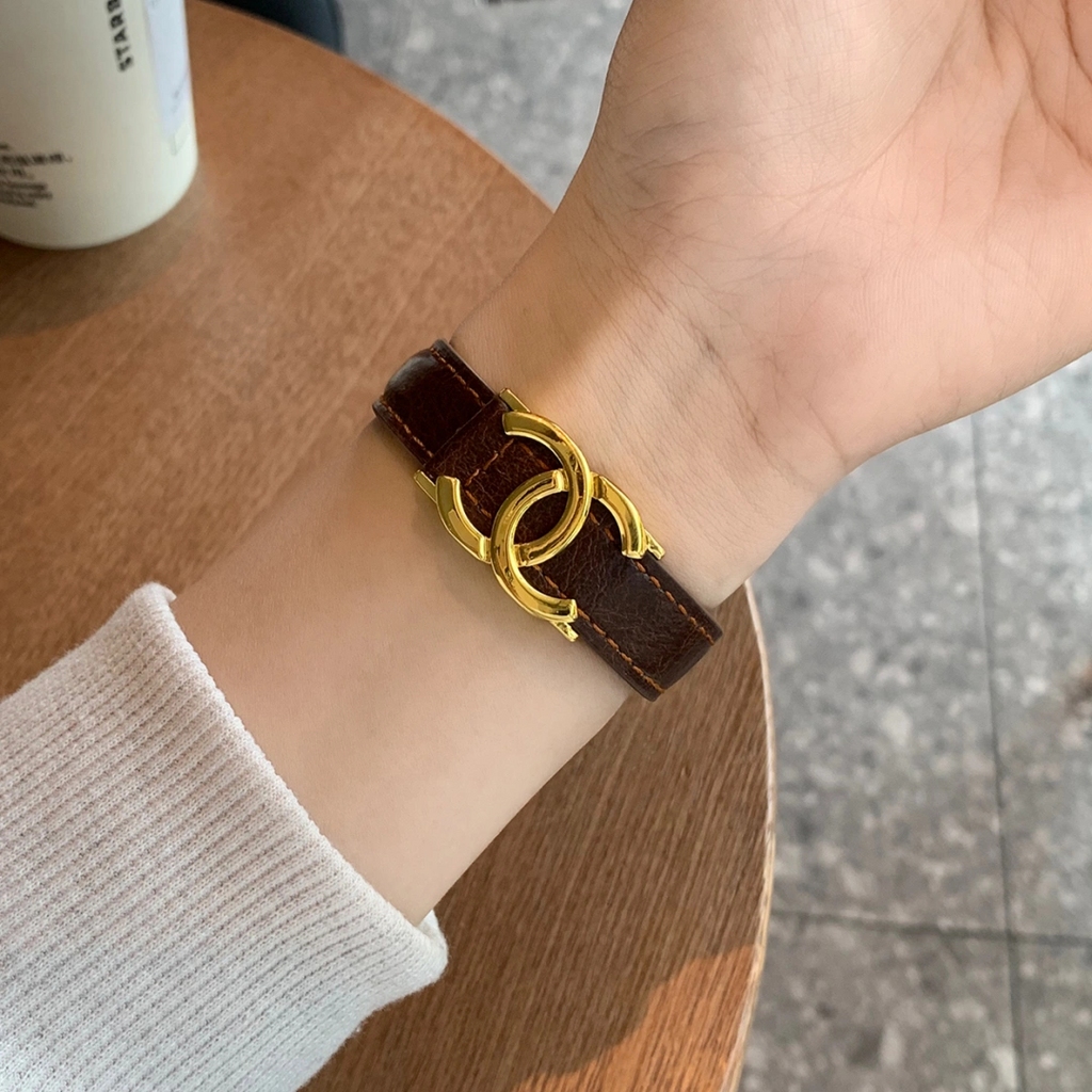 Chanel-inspired leather watch strap with metal detail