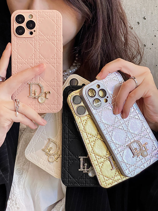 Dior-inspired pink textured iPhone case with emblem