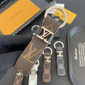 Louis Vuitton-inspired loop key holder with metal detail, brown big flower