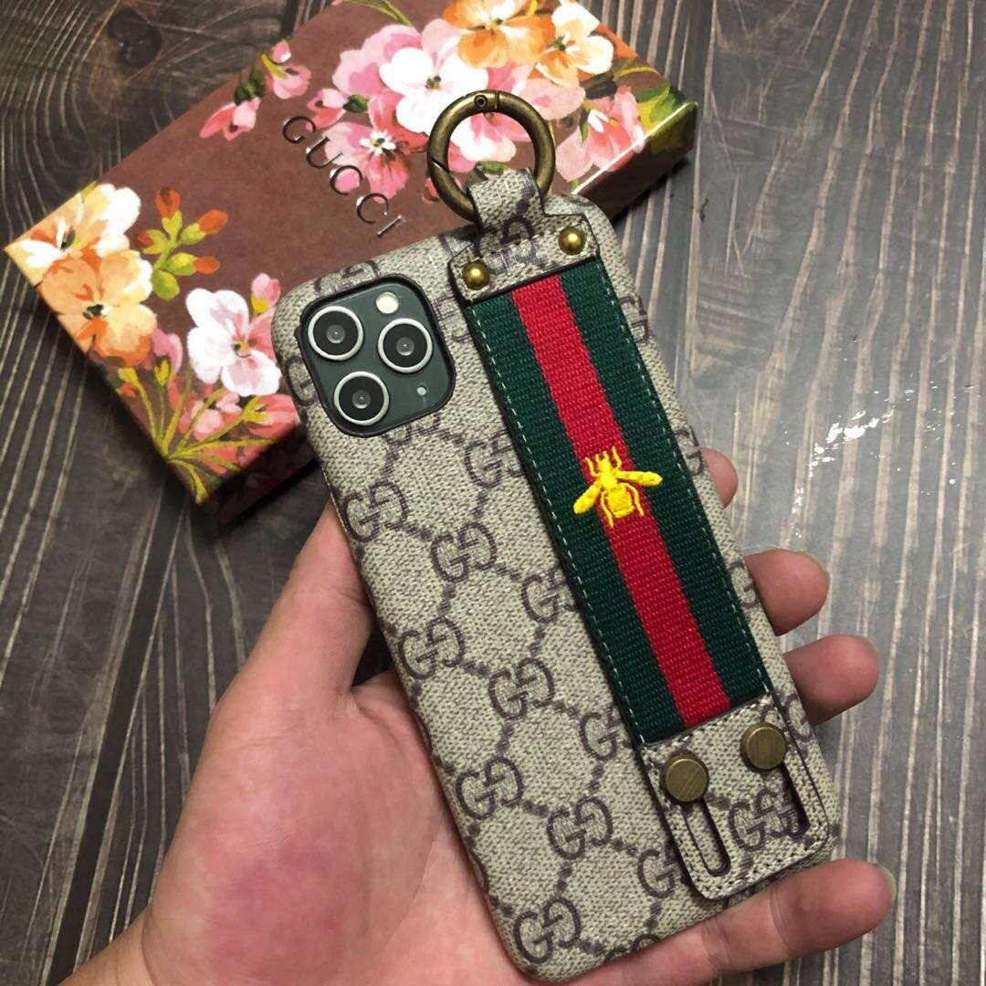 Gucci-inspired monogram iPhone case with striped hand strap