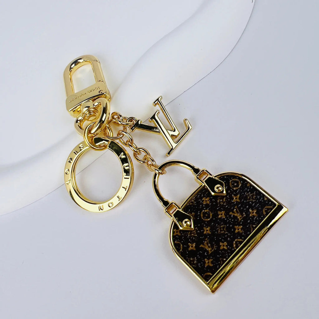 Louis Vuitton-inspired gold-tone charm keychain