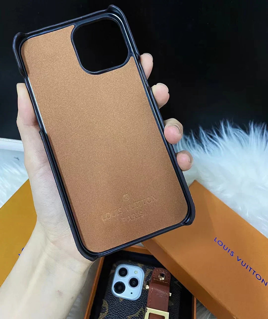 Louis Vuitton-inspired monogram phone case with buckle hand strap