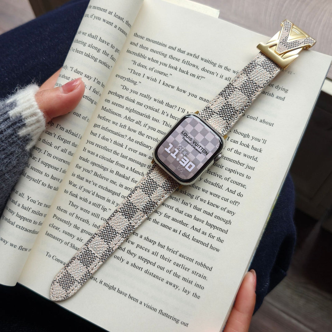 Louis Vuitton-inspired Apple Watch band with metal emblem