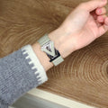 Louis Vuitton-inspired Apple Watch band with metal emblem