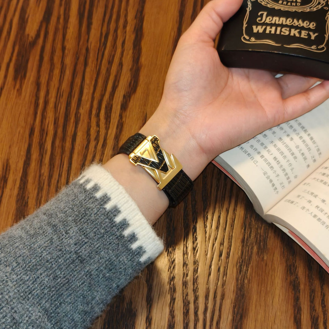 Louis Vuitton-inspired Apple Watch band with metal emblem