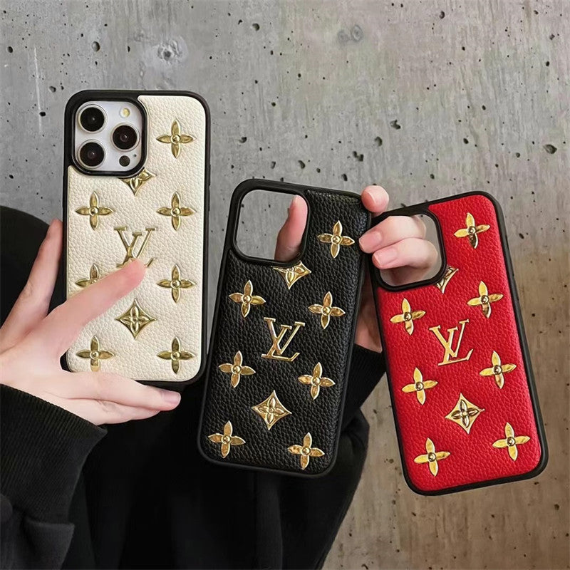 Louis Vuitton-inspired phone case with raised gold-tone pattern