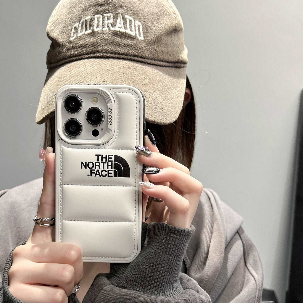 The North Face-inspired black and white puffer iPhone case