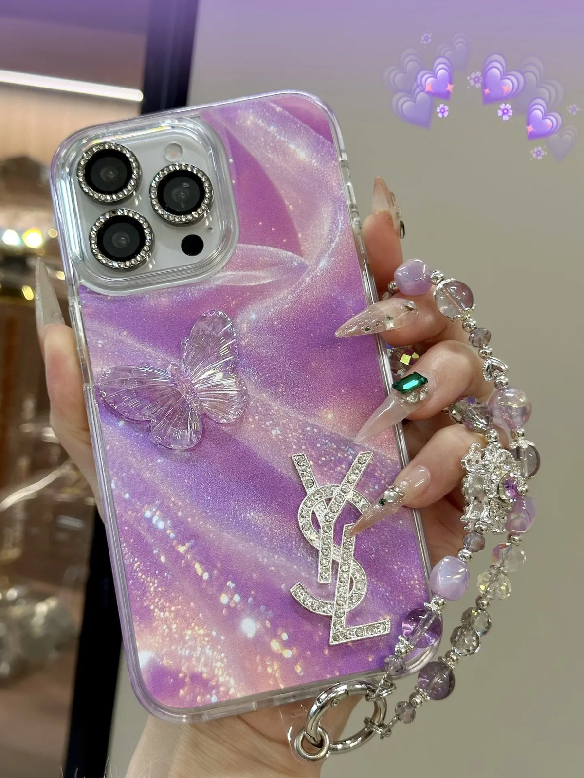 Louis Vuitton-inspired marbled phone case with chain charm